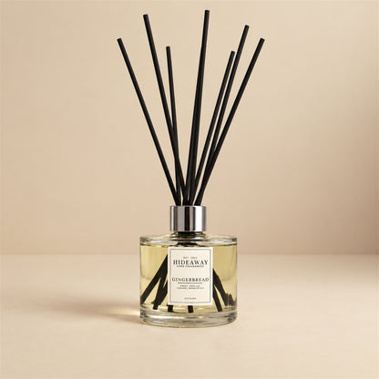 Gingerbread and warm cinnamon reed diffuser by Hideaway Home Fragrances featuring maple syrup, caramel, and cookie notes