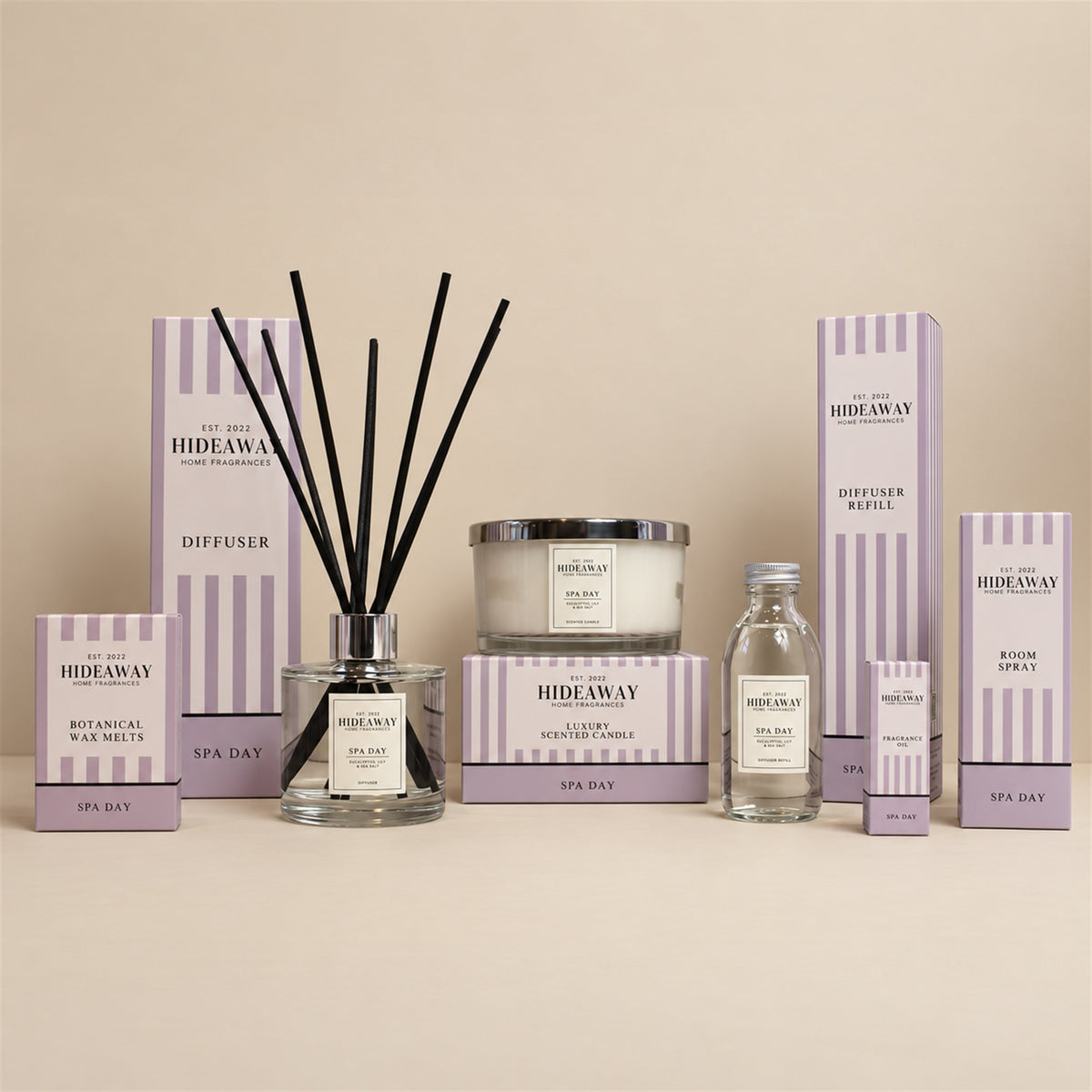 Hideaway Home Fragrances Spa Day range including 3 wick candles, wax melts, reed diffusers, fragrance oil, and room spray