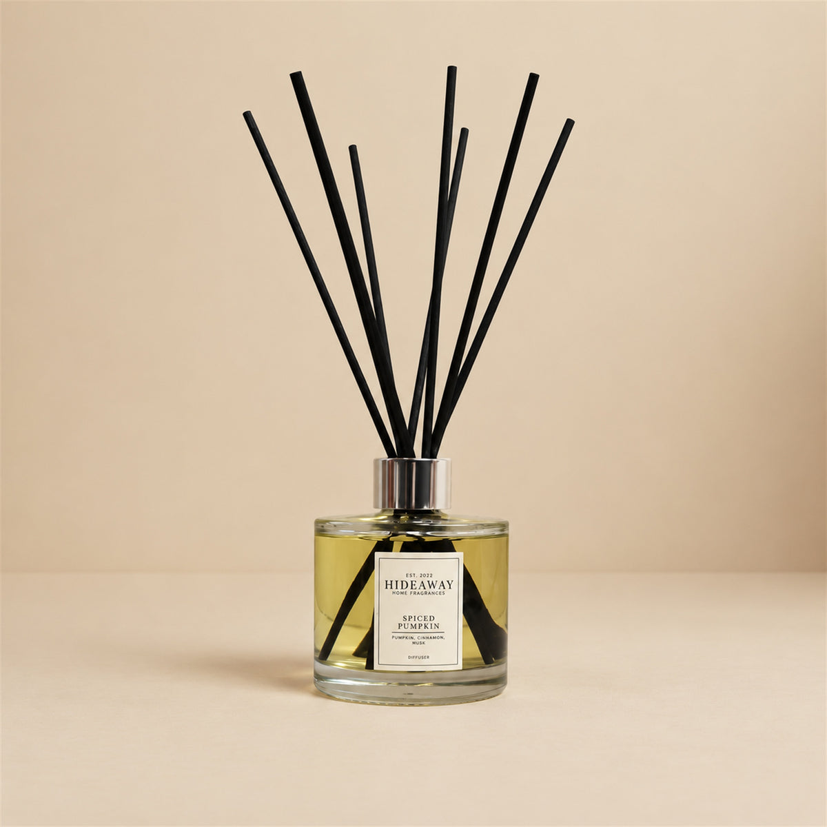 Cosy autumn spiced pumpkin reed diffuser by Hideaway Home Fragrances for warm living room and hallway scenting
