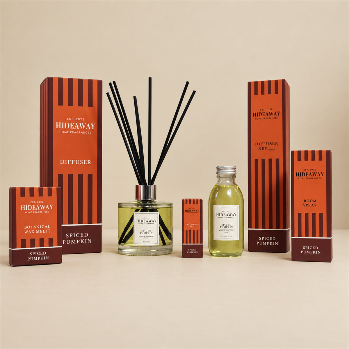Hideaway Home Fragrances spiced pumpkin collection including diffusers, candles, wax melts, and sprays
