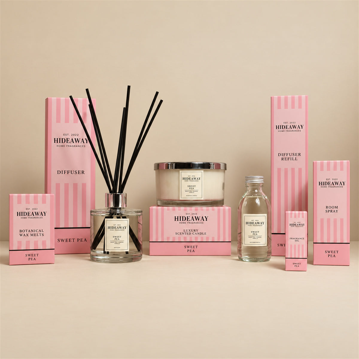 Hideaway Home Fragrances Sweet Pea range including 3 wick candles, wax melts, reed diffusers, fragrance oil, and room spray