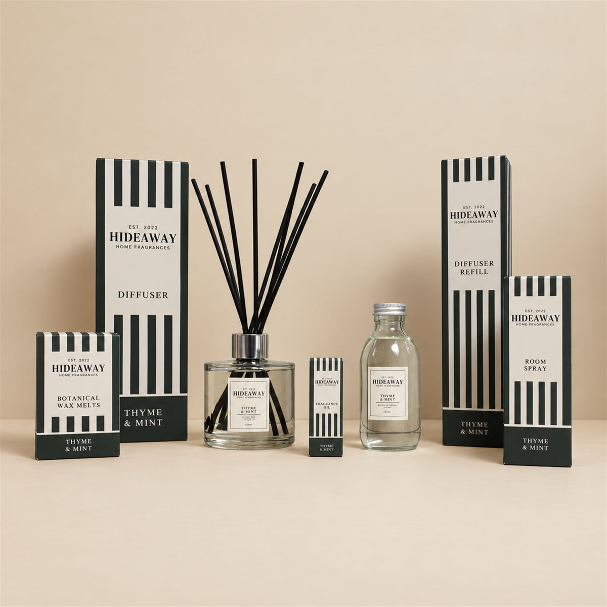 Hideaway Home Fragrances thyme and mint collection including diffusers, candles, wax melts, and room sprays