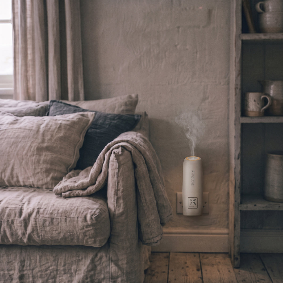 Kapplico Waterless Plug-In Diffuser in a compact, modern design by Hideaway Home Fragrances, shown unplugged on a neutral background.