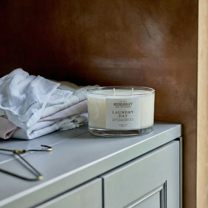 Luxury Laundry Day three-wick candle inspired by sun-dried linens, creating a calm and breezy home scent