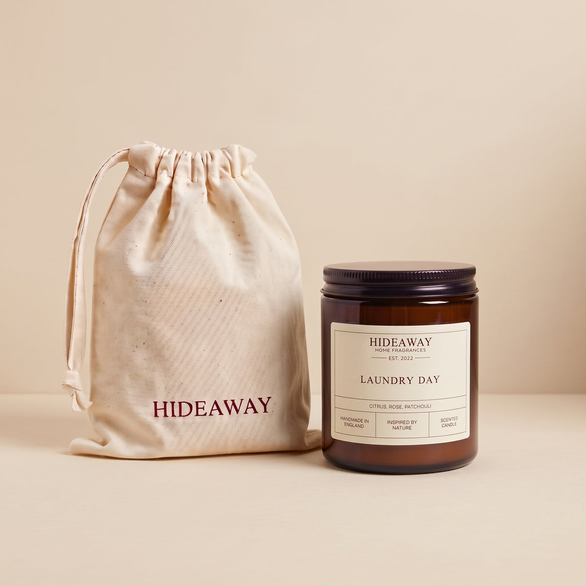 Clean crisp laundry day aromatic candle in an amber glass jar creating a fresh scent atmosphere from Hideaway Home Fragrances