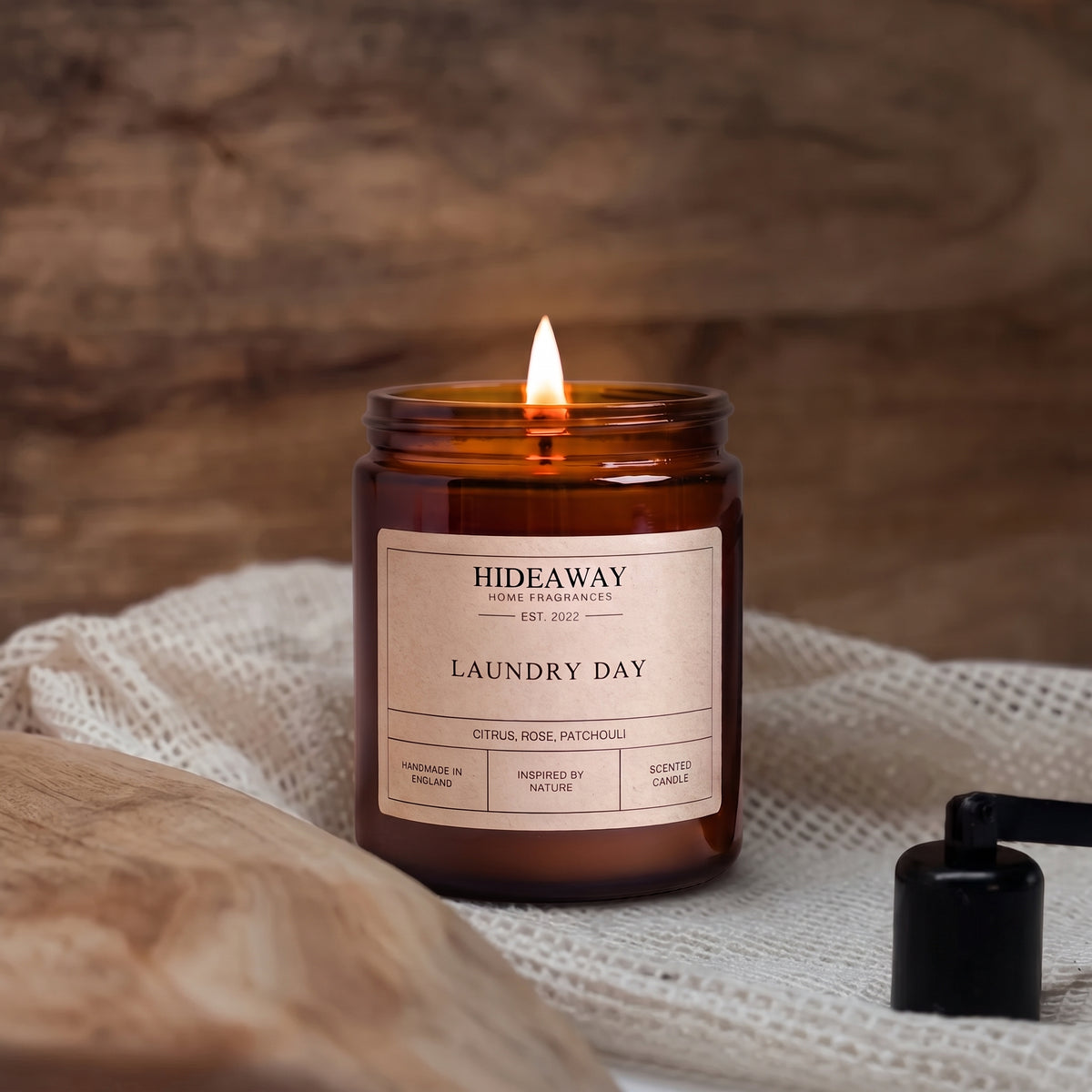 Fresh laundry day amber glass jar candle styled in a bright minimalist bathroom, Hideaway Home Fragrances