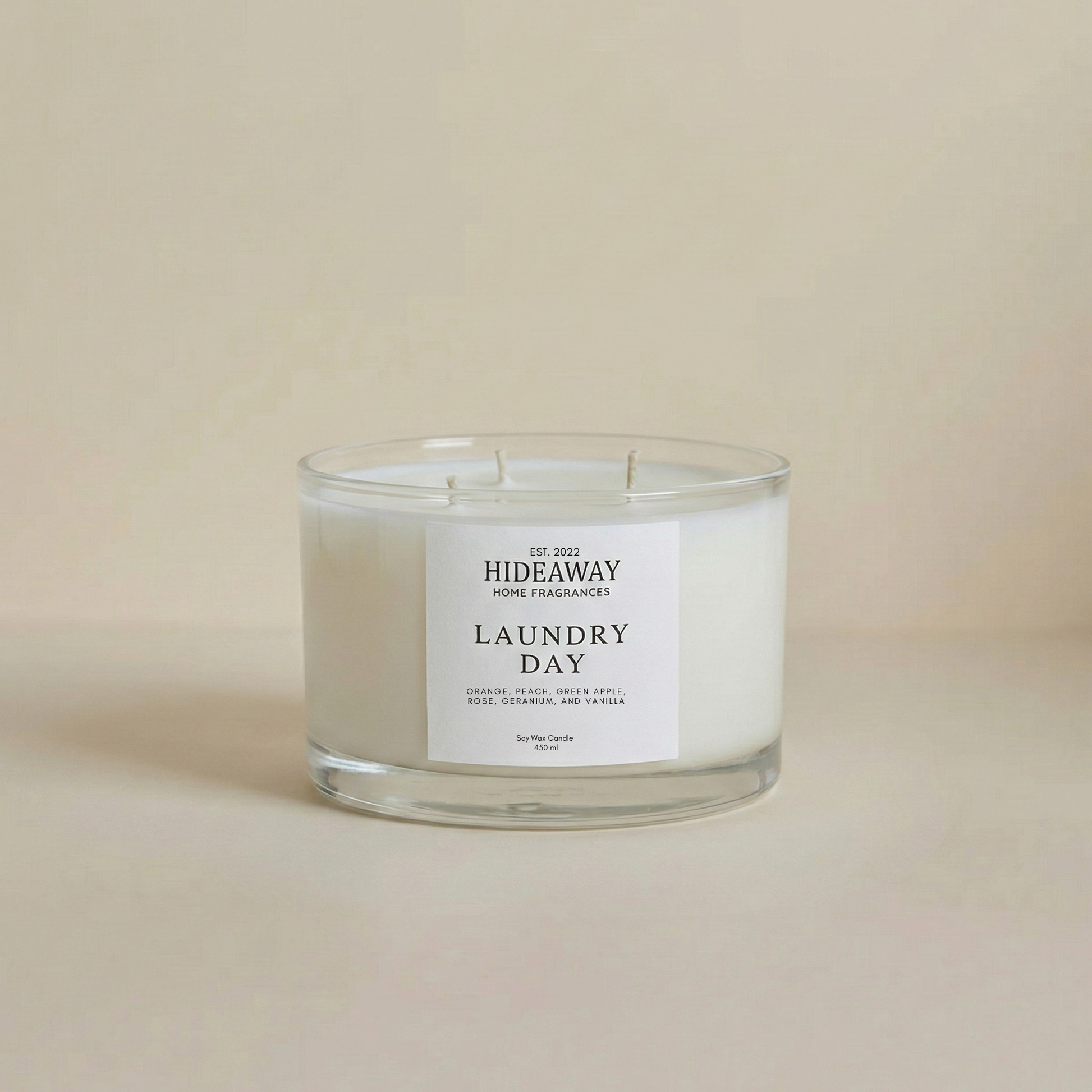 Refreshing Laundry Day three-wick candle filling a room with breezy, clean linen scent, rose, vanilla, and patchouli for effortless home freshness