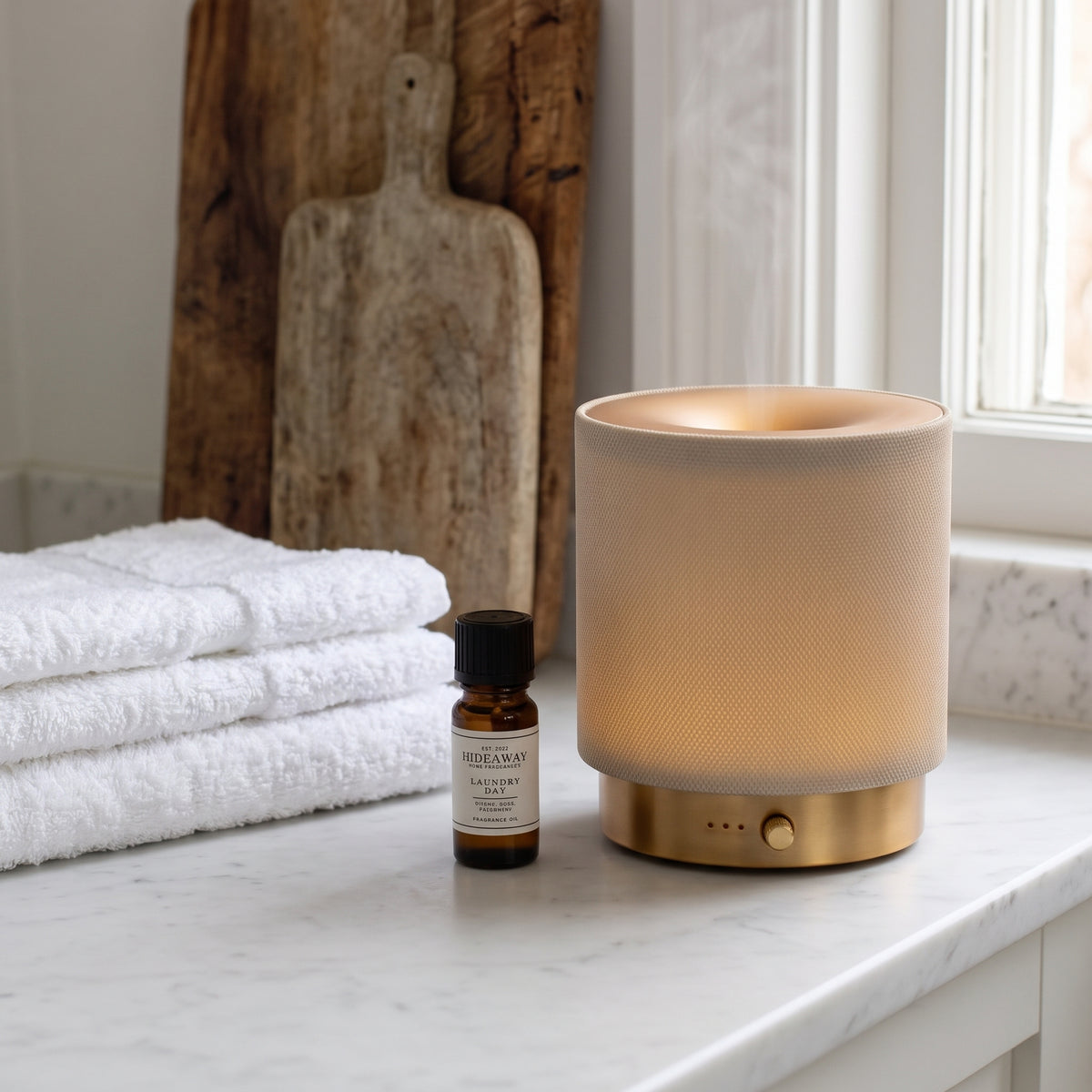 Fragrance notes breakdown for Hideaway Home Fragrances laundry day fragrance oil featuring crisp green apple, fresh peach, rose, and patchouli.