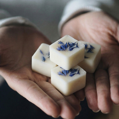 Fresh-scented Laundry Day botanical wax melting in a white ceramic wax warmer - Hideaway Home Fragrances