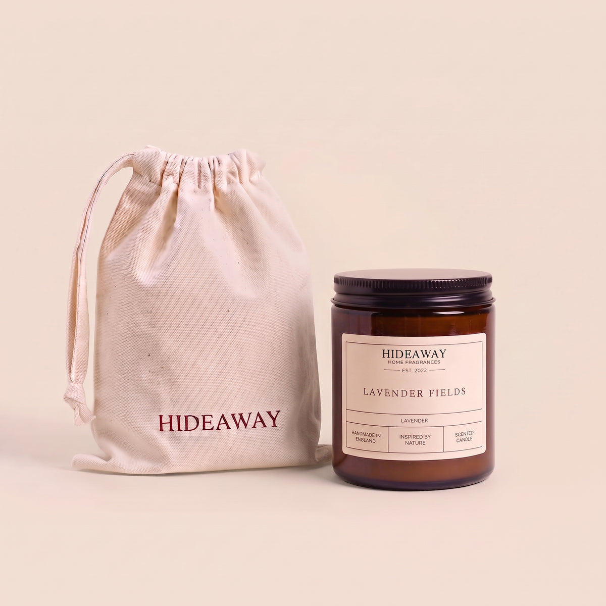Relaxing lavender fields aromatic candle in an amber glass jar creating a tranquil sleep atmosphere from Hideaway Home Fragrances