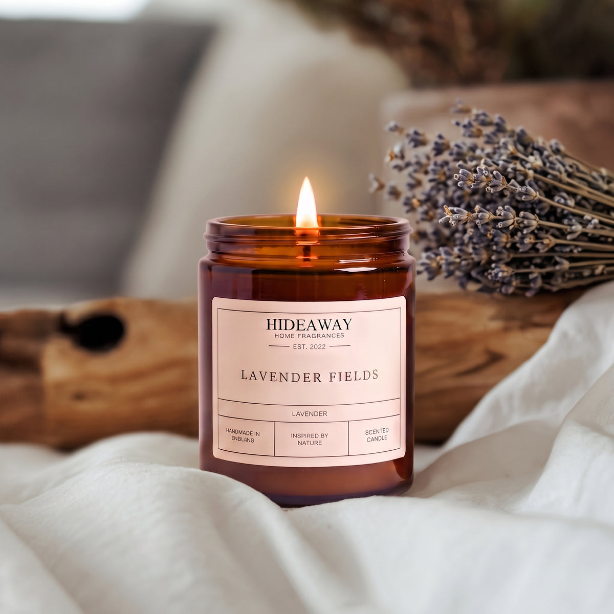 Soothing lavender fields amber glass jar candle styled on a rustic wooden nightstand, Hideaway Home Fragrances