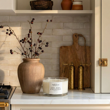 Invigorating Lime, Basil & Mandarin three-wick candle filling a living space with crisp, vibrant Caribbean-inspired scent
