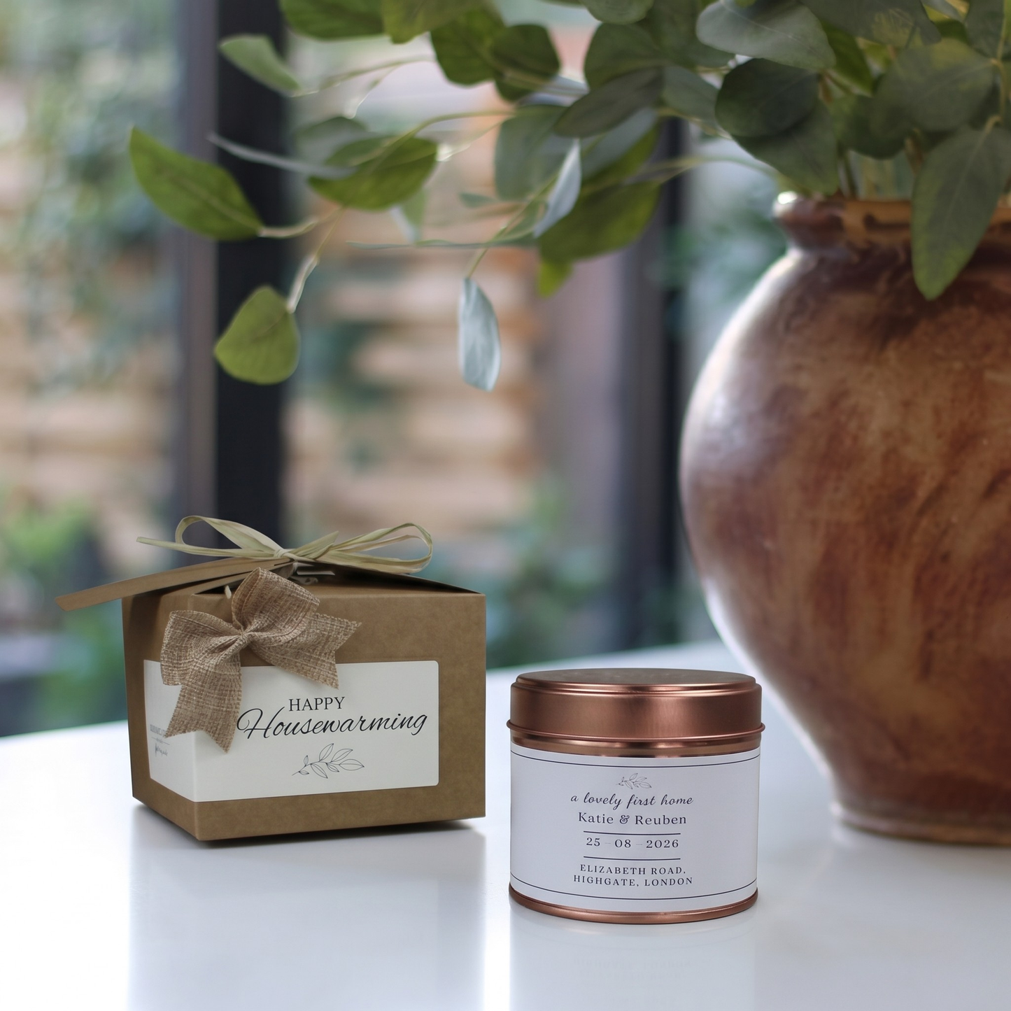 Custom first time buyer housewarming gift box featuring a personalized new home milestone candle and matching home fragrance diffuser by Hideaway Home Fragrances.