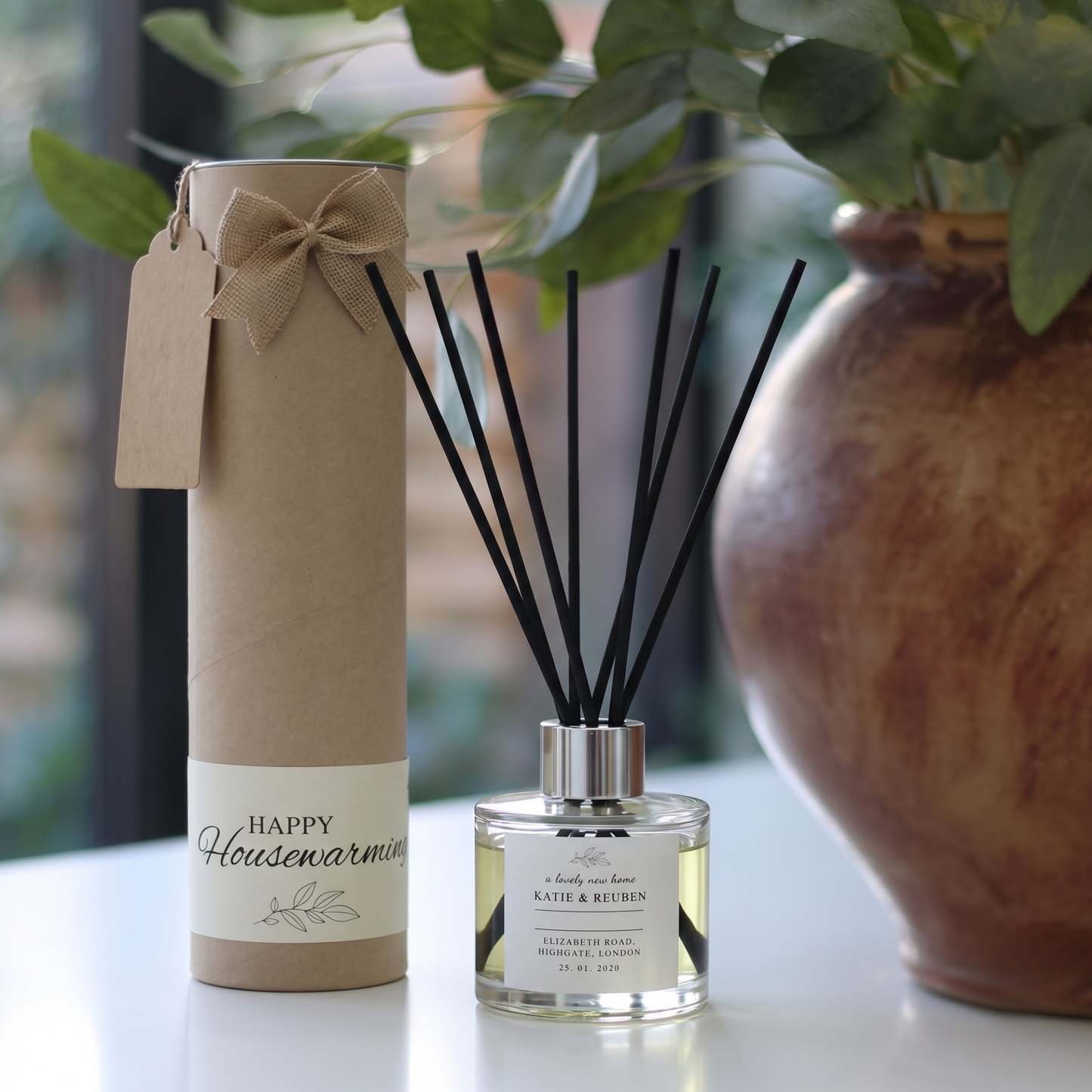 Personalised "Lovely New Home" candle and luxury reed diffuser keepsake gift set, beautifully packaged and ready to gift by Hideaway Home Fragrances.