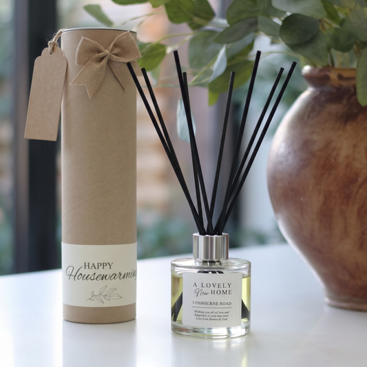 Personalised "Lovely New Home" candle and luxury reed diffuser keepsake gift set customized with a new address, ready to gift by Hideaway Home Fragrances.