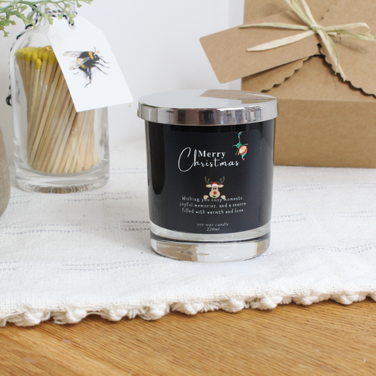 Personalised Merry Christmas candle with elf and reindeer design – Hideaway Home Fragrances