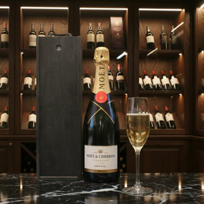 Close up of the Moët & Chandon Champagne label with the black presentation box in the background.