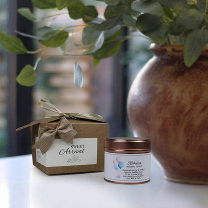 Custom luxury baby shower gift box featuring a personalized pregnancy celebration candle and matching home fragrance diffuser by Hideaway Home Fragrances.