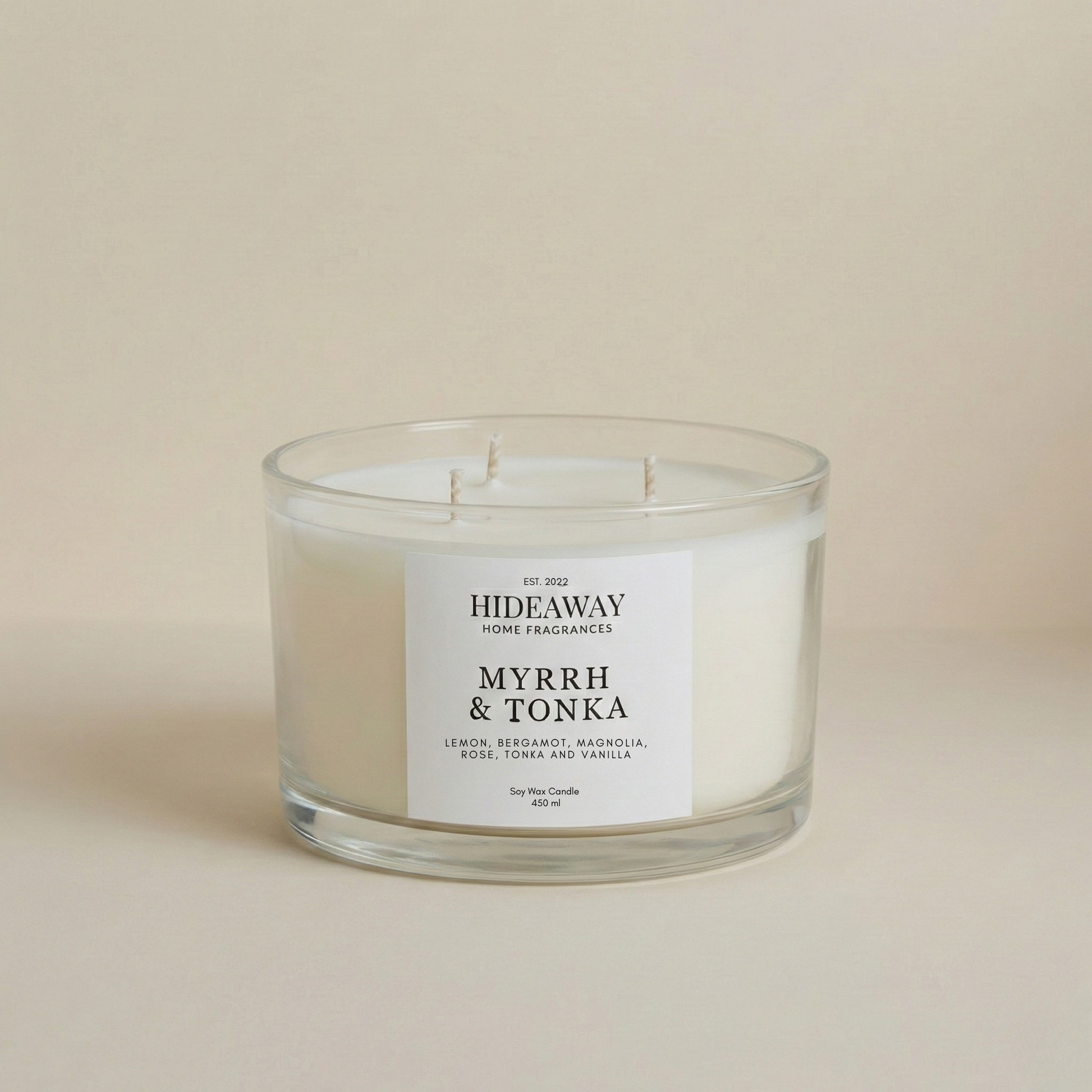 Myrrh & Tonka 3-wick luxury candle with rich resinous fragrance of myrrh, tonka bean, amber, and vanilla for a warm, opulent home atmosphere