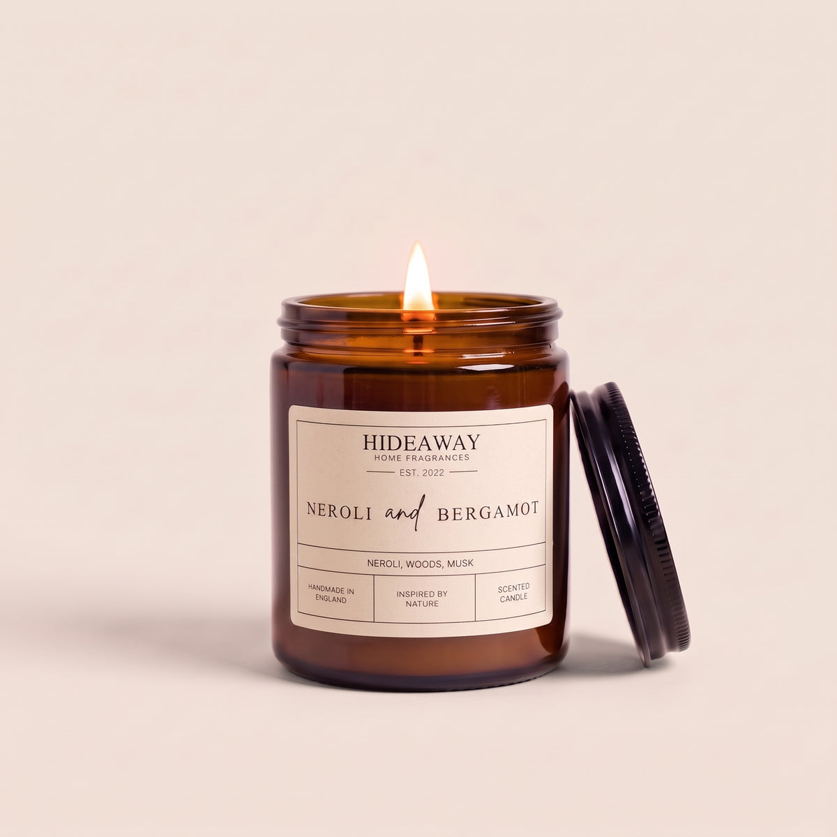Hand-poured neroli and bergamot amber glass candle featuring notes of sweet orange blossom, bitter bergamot, and floral citrus, Hideaway Home Fragrances