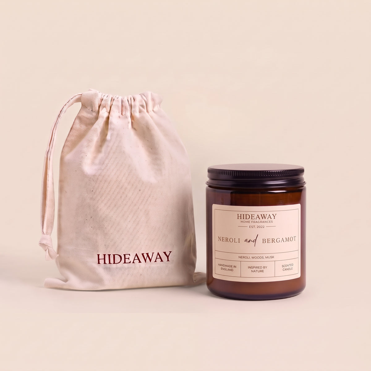 Uplifting neroli and bergamot aromatic candle in an amber glass jar creating a vibrant floral atmosphere from Hideaway Home Fragrances