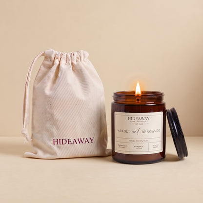 Neroli and bergamot amber glass candle with fresh citrus floral scent by Hideaway Home Fragrances