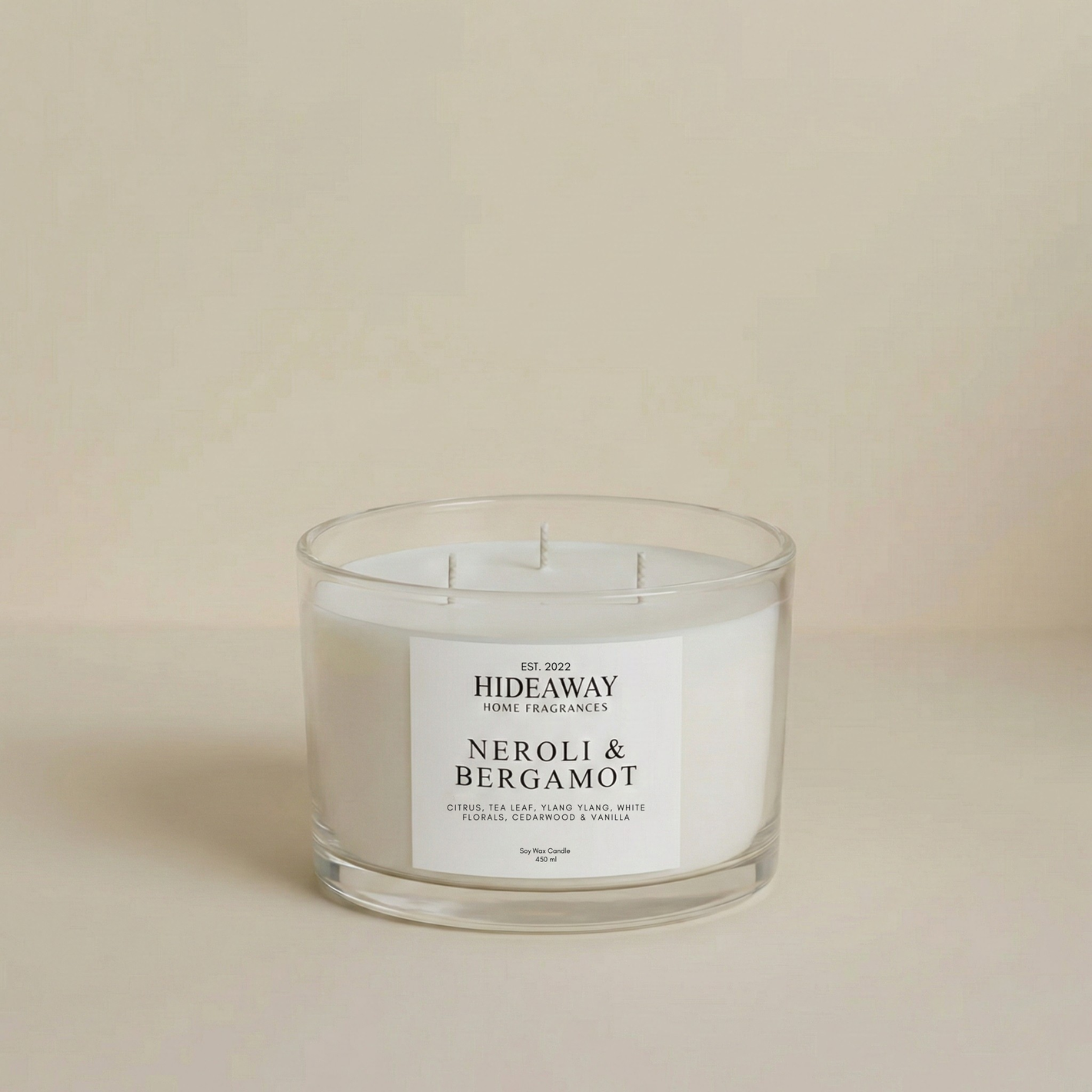 “Neroli & Bergamot 3-wick luxury candle with zesty citrus fragrance creating an uplifting and energising home atmosphere