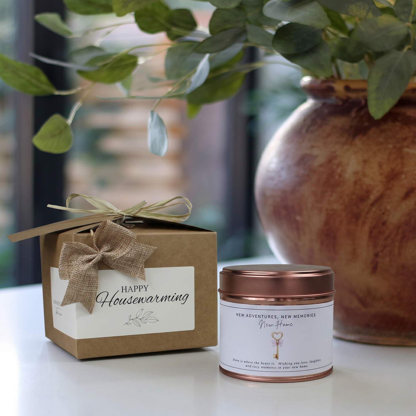 Custom housewarming care package gift box featuring a personalized first home adventure candle and matching home fragrance diffuser by Hideaway Home Fragrances.