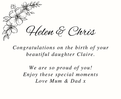 Luxury personalized new parents celebration hamper with a sentimental welcome to the world baby tribute candle and reed diffuser, elegantly boxed by Hideaway Home Fragrances.