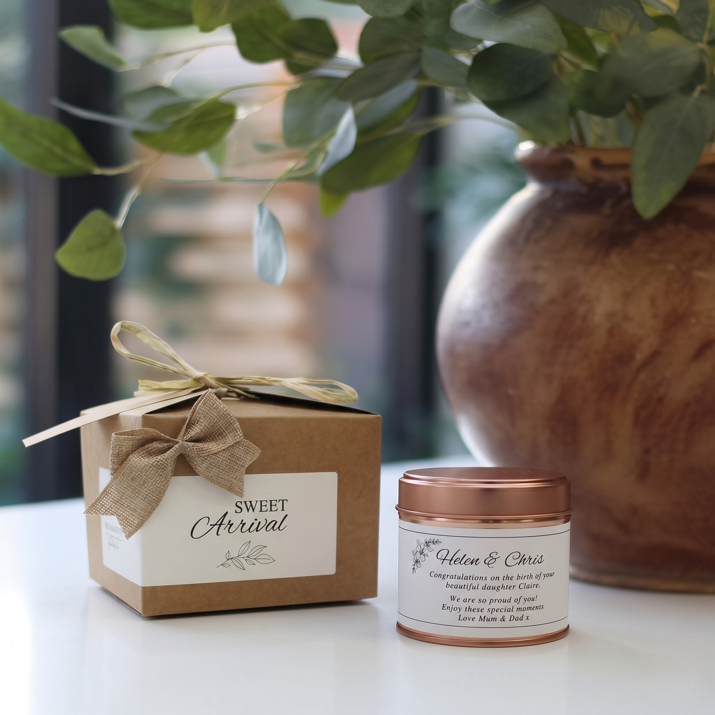 Custom luxury newborn baby arrival gift box featuring a personalized new birth congratulations candle and matching home fragrance diffuser by Hideaway Home Fragrances.