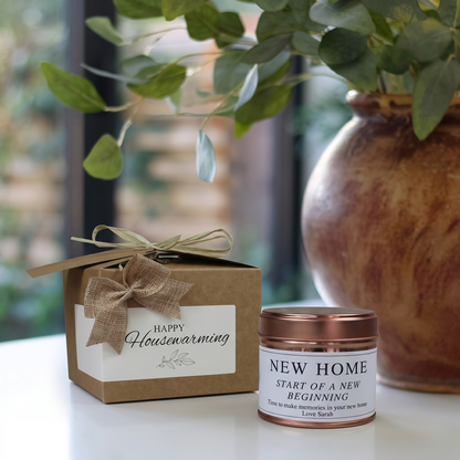 Custom housewarming care package gift box featuring a personalized new homeowner congratulations candle and matching home fragrance diffuser by Hideaway Home Fragrances.