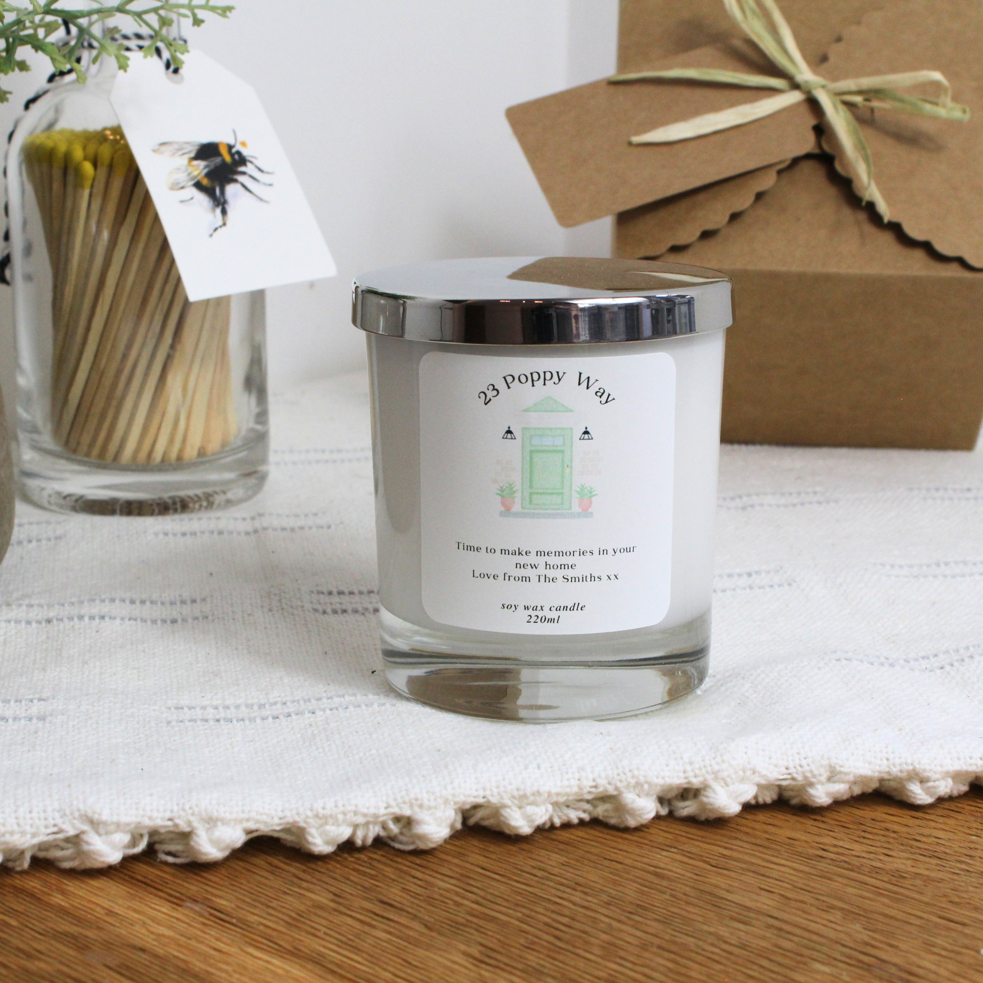 Elegant housewarming candle featuring green front door illustration – Hideaway Home Fragrances