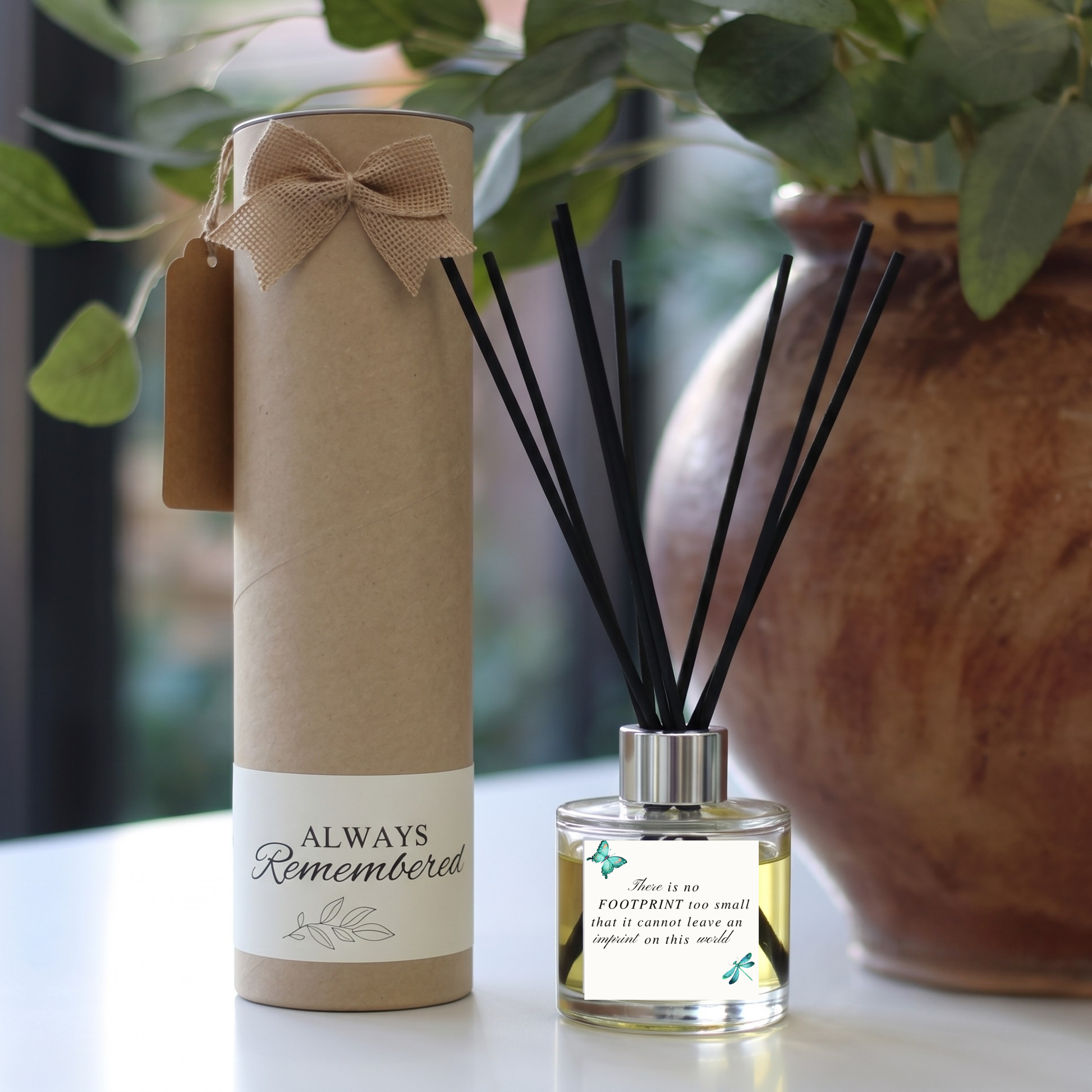 Personalised "No Footprint Too Small" candle and luxury reed diffuser keepsake gift set, beautifully packaged and ready to gift by Hideaway Home Fragrances.