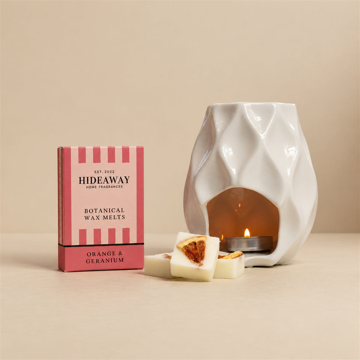 Hideaway Home Fragrances orange and geranium botanical wax melts sustainable packaging detailing notes of fresh orange blossom and woody vetiver