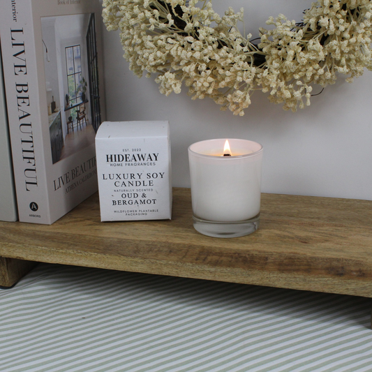 Luxury Oud & Bergamot Candle with bright Italian bergamot, clove spice, and deep oud heart – Hideaway Home Fragrances