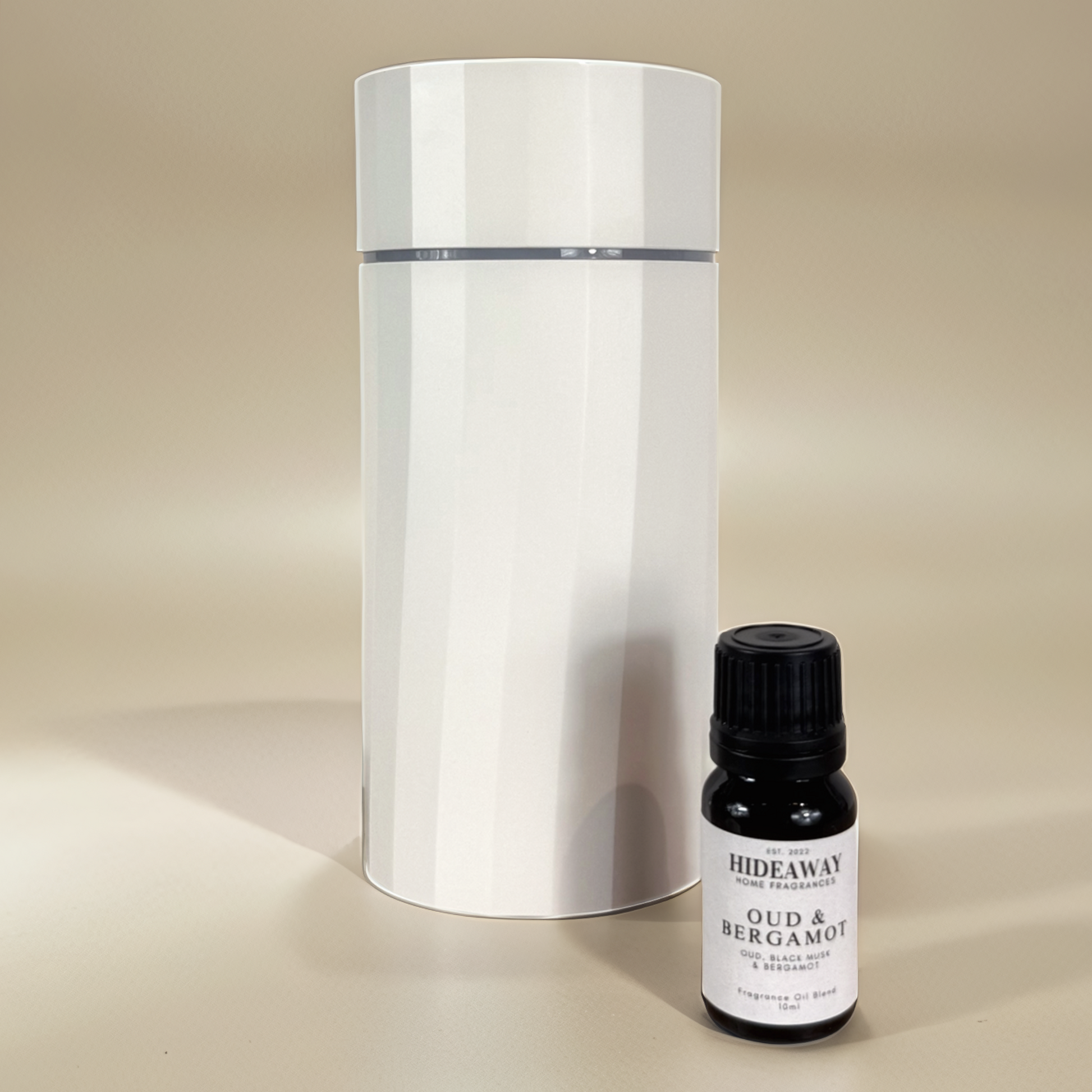 Rich and alluring Oud & Bergamot Fragrance Oil blending citrus, clove, and cinnamon for a captivating scent experience — Hideaway Home Fragrances