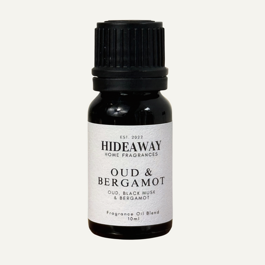 Sophisticated Oud & Bergamot Fragrance Oil with smoky spice and warm musk, perfect for creating an elegant atmosphere — Hideaway Home Fragrances