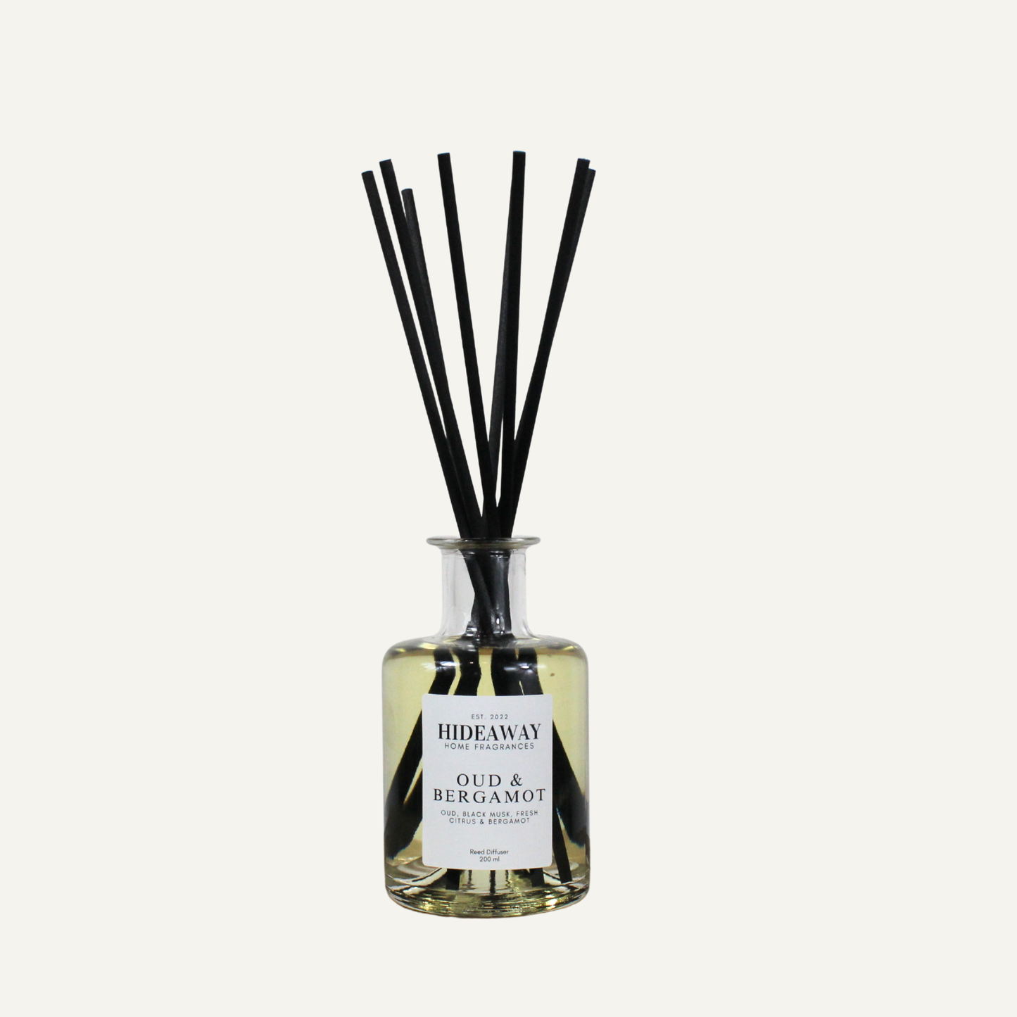 Luxury oud bergamot reed diffuser for study or lounge, crisp citrus and smoky resin scent