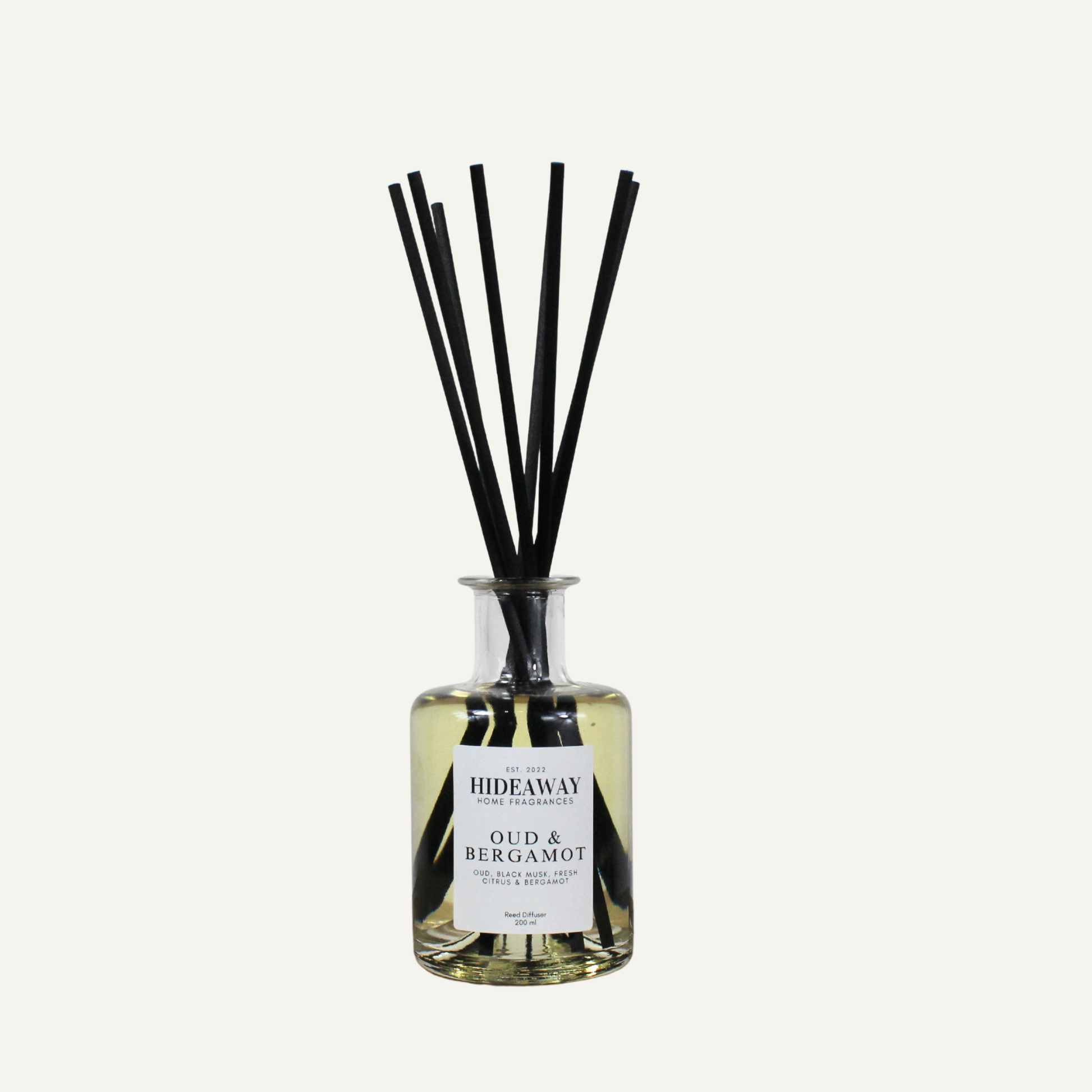 Luxury oud bergamot reed diffuser for study or lounge, crisp citrus and smoky resin scent