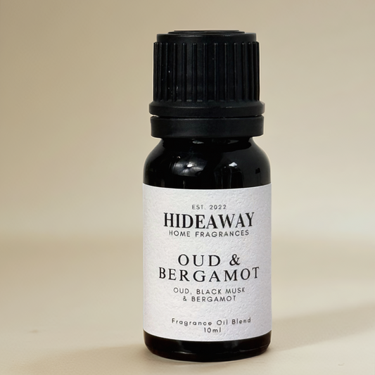 Sophisticated Oud & Bergamot Fragrance Oil with smoky spice and warm musk, perfect for creating an elegant atmosphere — Hideaway Home Fragrances