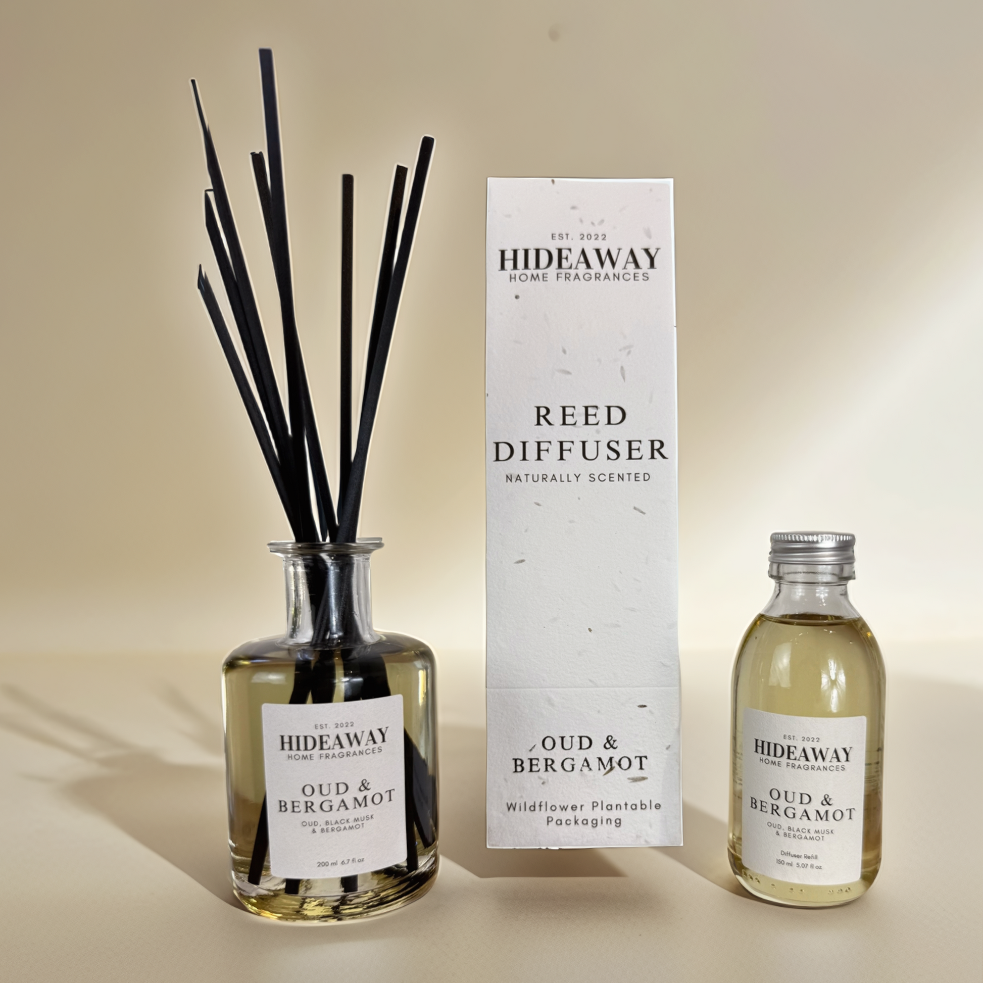 Luxury reed diffuser featuring Italian bergamot, clove, oud, and cinnamon - Hideaway Home Fragrances