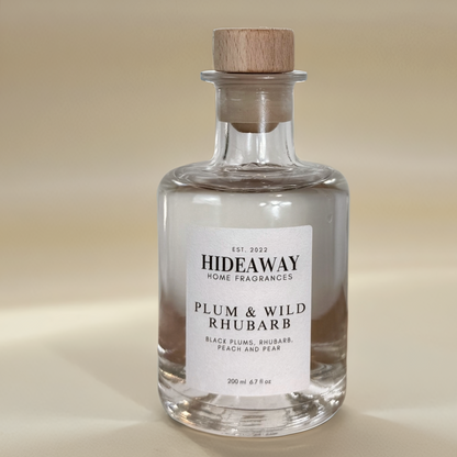 Juicy reed diffuser featuring rhubarb, black plum, and soft vanilla notes - Hideaway Home Fragrances