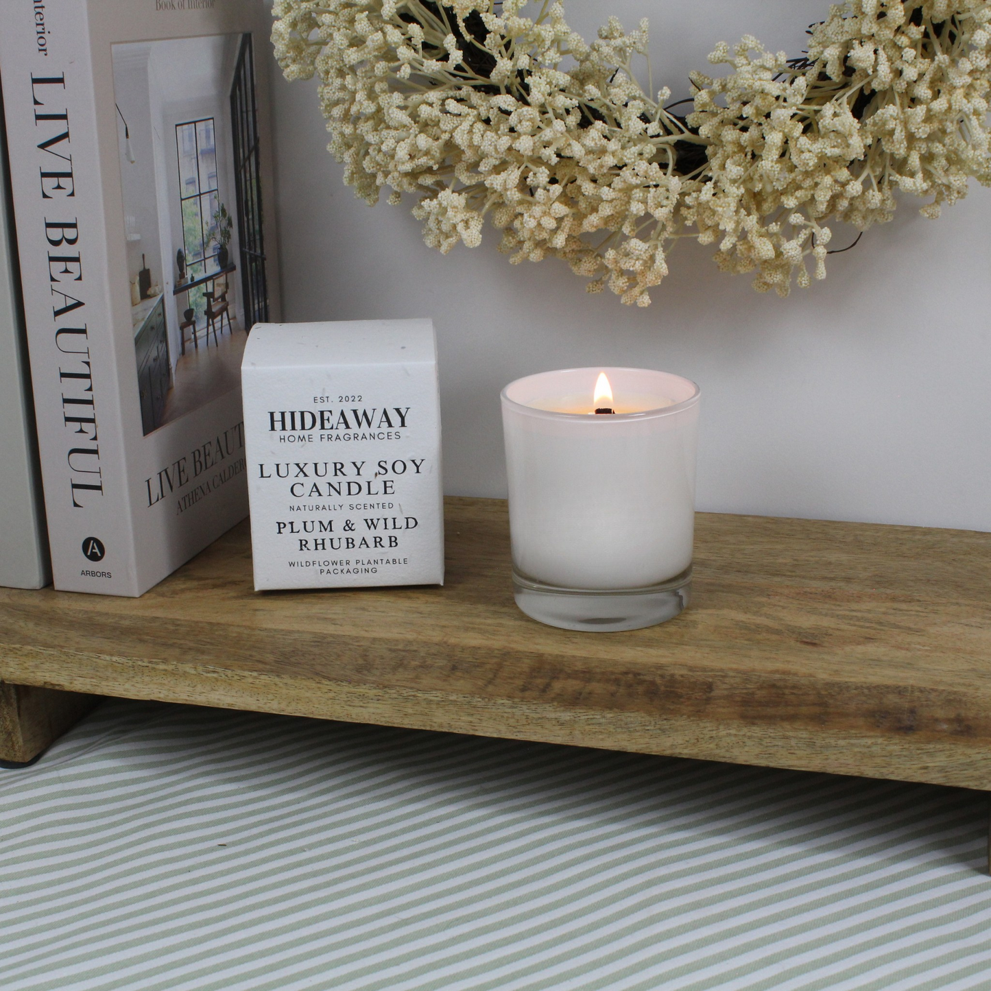 Luxury Plum & Wild Rhubarb Candle blending tart rhubarb, black plum, cedarwood, and vanilla musk – Hideaway Home Fragrances
