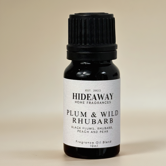 Juicy and tart Plum & Wild Rhubarb Fragrance Oil with bright grapefruit, black plum, and soft cedarwood base notes – Hideaway Home Fragrances.