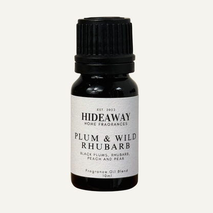 Juicy and tart Plum & Wild Rhubarb Fragrance Oil with bright grapefruit, black plum, and soft cedarwood base notes – Hideaway Home Fragrances.