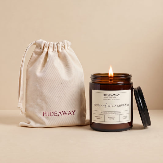 Plum and wild rhubarb amber glass candle with sweet fruity tart scent by Hideaway Home Fragrances