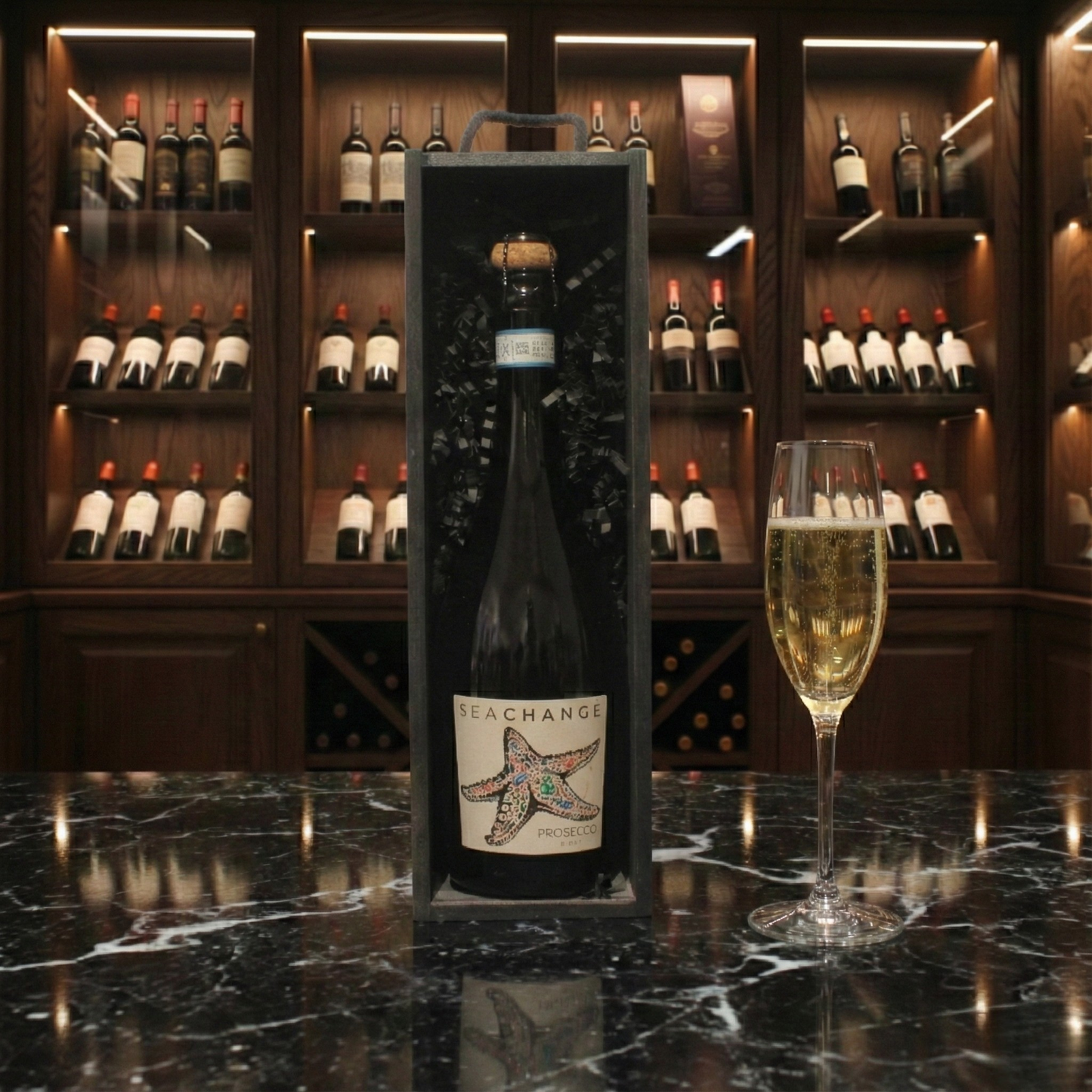 The Prosecco Reserve Gift Box featuring a bottle of Sea Change Prosecco inside a sleek black wooden wine box.