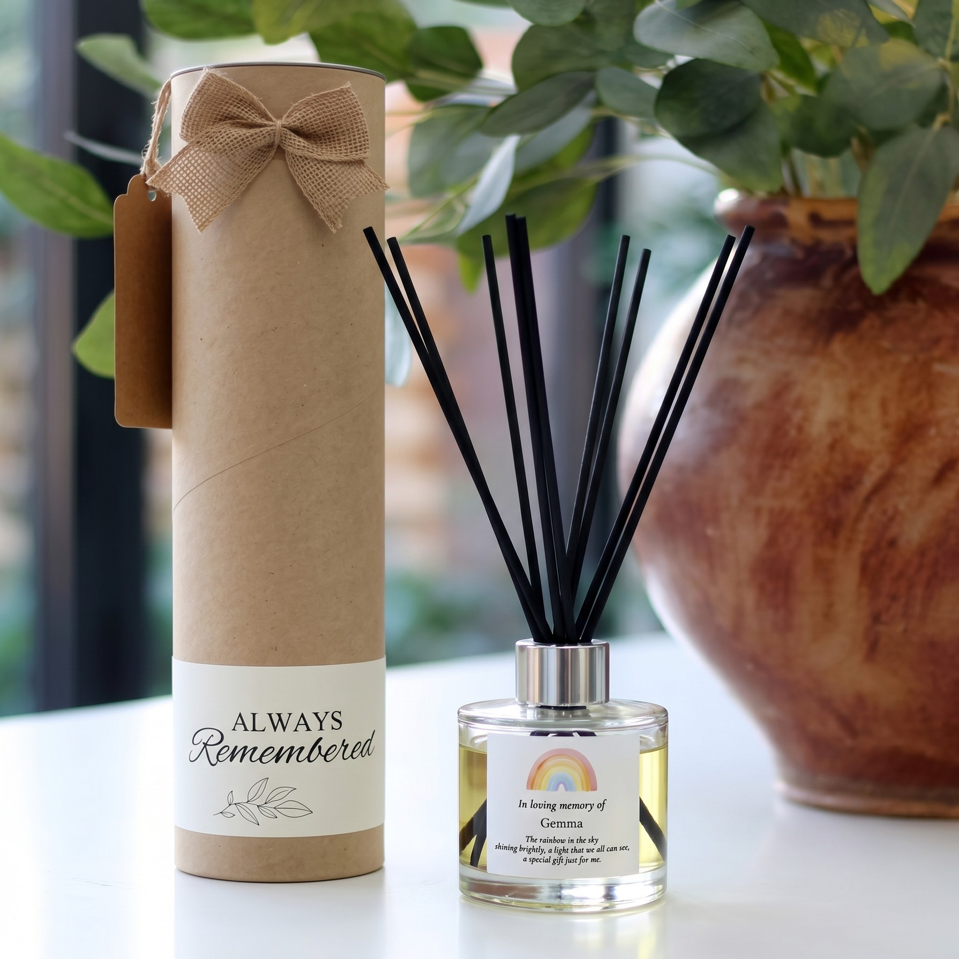 Personalised "In Loving Memory" rainbow candle and luxury reed diffuser keepsake gift set, beautifully packaged and ready to gift by Hideaway Home Fragrances.