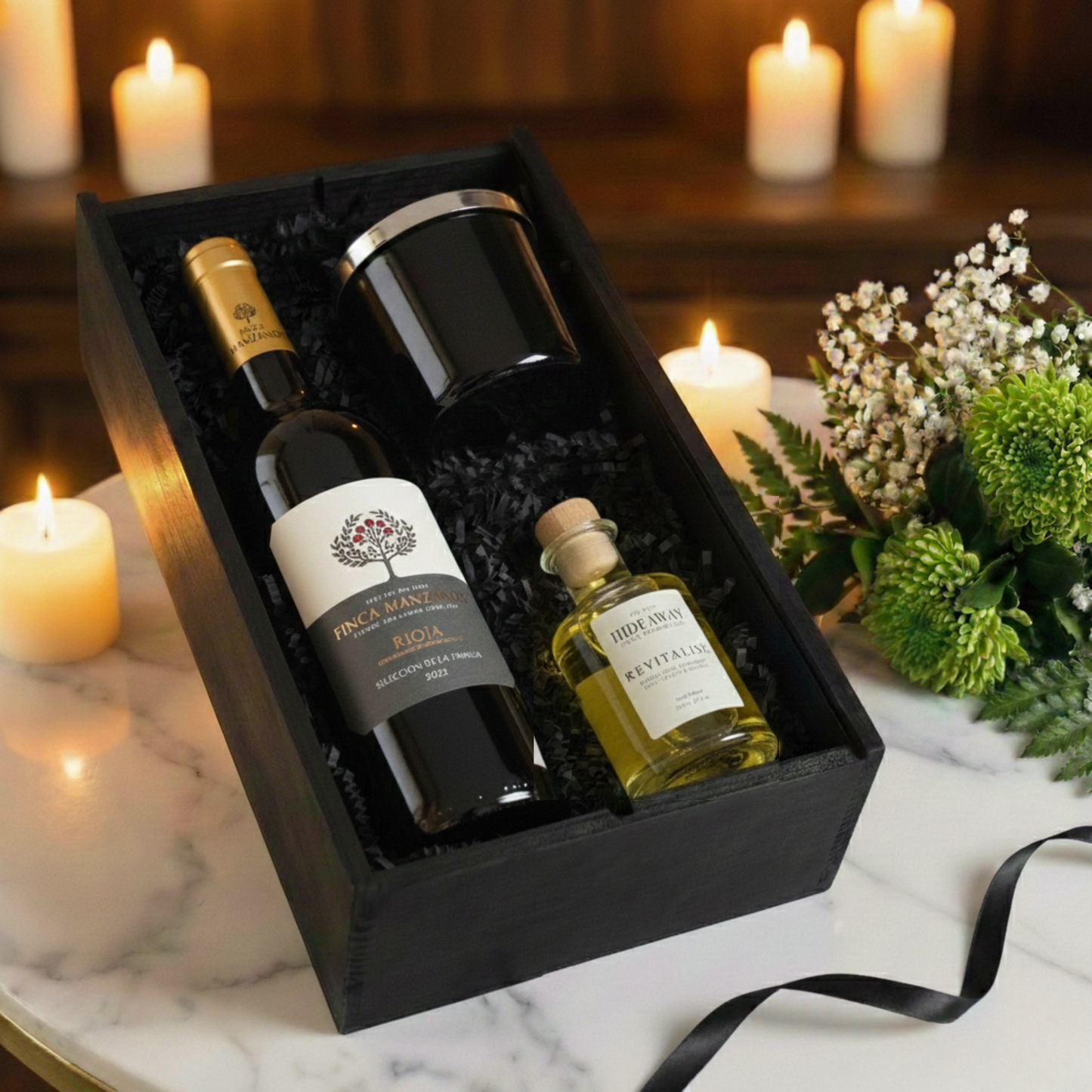 Choice of Red, White, or Rosé wine displayed with matching home fragrance accessories in a premium gift box.