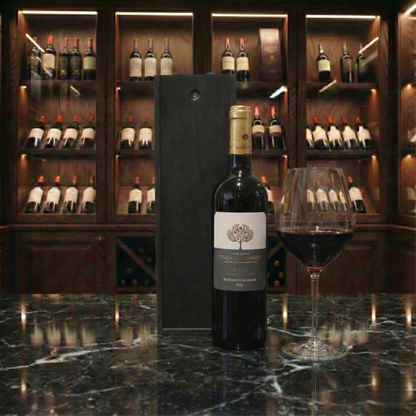Selection of Finca Manzanos Red, White, and Rosé wine bottles next to an open black presentation case.